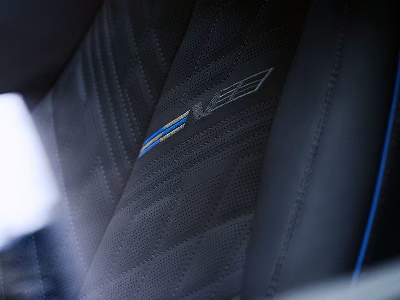 V-Series logo stitched into a 2027 Cadillac OPTIQ-V seat